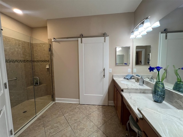 5031 Serata Dr, Bradenton, FL 34211 - full bath with tile patterned floors, a shower stall, vanity, and baseboards