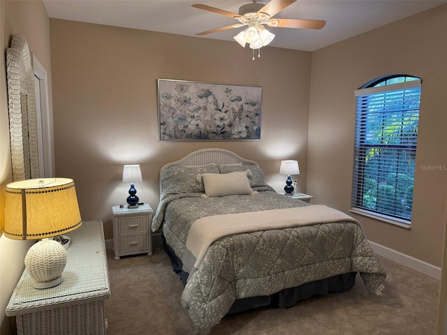 5031 Serata Dr, Bradenton, FL 34211 - carpeted bedroom featuring ceiling fan and baseboards