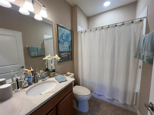 5031 Serata Dr, Bradenton, FL 34211 - full bath featuring shower / bath combo, vanity, toilet, and tile patterned floors