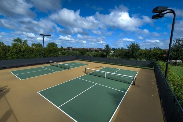 5031 Serata Dr, Bradenton, FL 34211 - view of sport court with community basketball court and fence