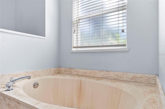 full bathroom featuring a garden tub