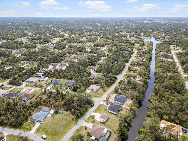 aerial view featuring a residential view and a water view