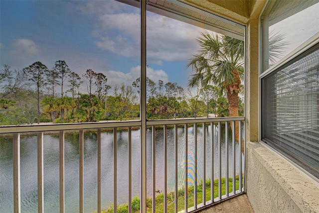 balcony featuring a water view