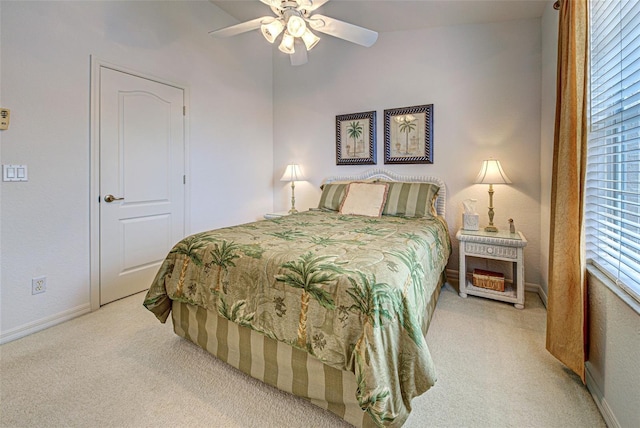 bedroom featuring carpet floors, baseboards, and a ceiling fan