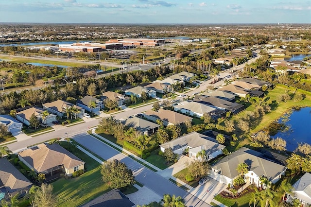 aerial view featuring a water view and a residential view