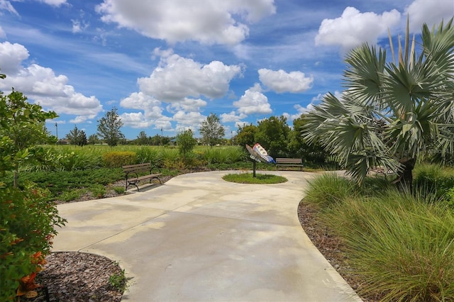 surrounding community featuring a patio