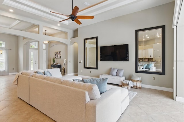 8420 Sailing Loop, Lakewood Ranch, FL 34202 - living room with arched walkways, light tile patterned flooring, ceiling fan, recessed lighting, and baseboards