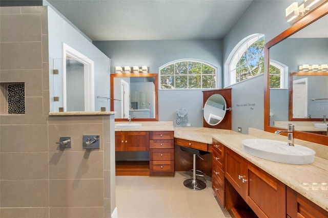 8420 Sailing Loop, Lakewood Ranch, FL 34202 - full bath with vanity, tile patterned floors, and tiled shower