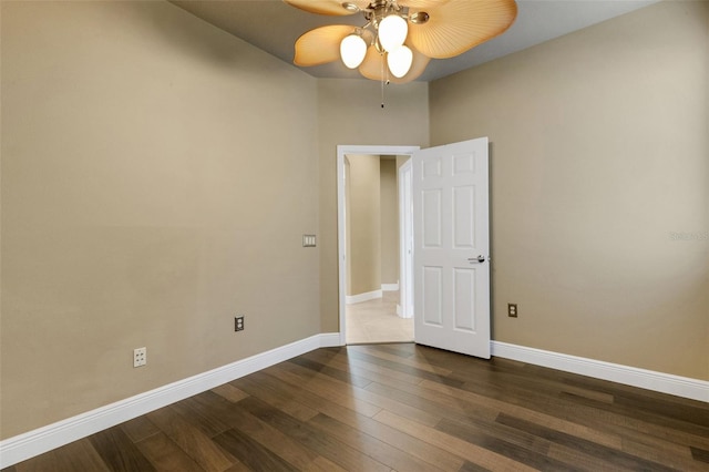 8420 Sailing Loop, Lakewood Ranch, FL 34202 - spare room with a ceiling fan, dark wood finished floors, and baseboards