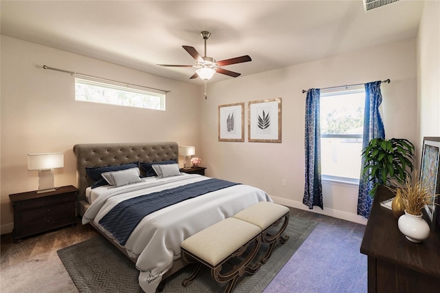 bedroom featuring carpet flooring, a ceiling fan, and baseboards