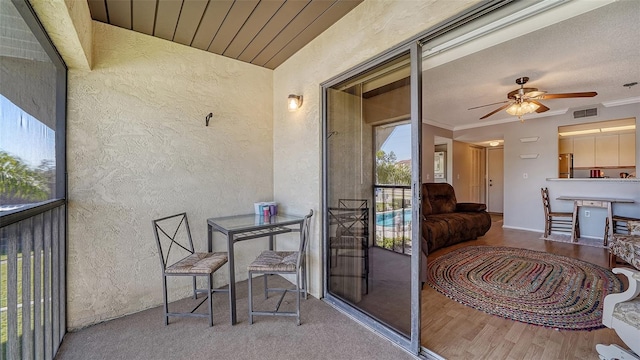 balcony featuring visible vents