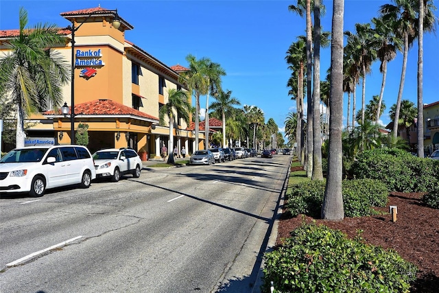 view of street with curbs