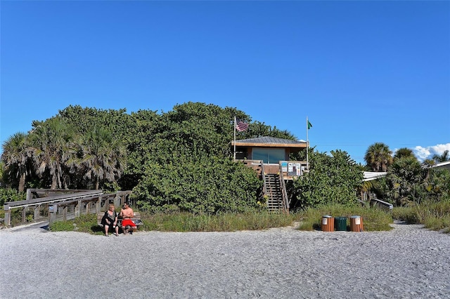 surrounding community featuring stairs