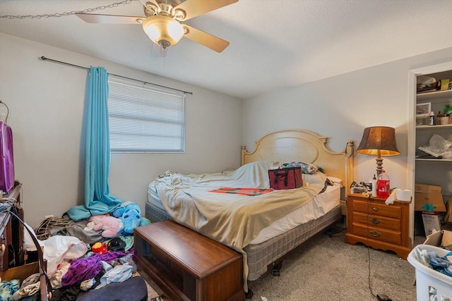 bedroom featuring carpet floors and a ceiling fan