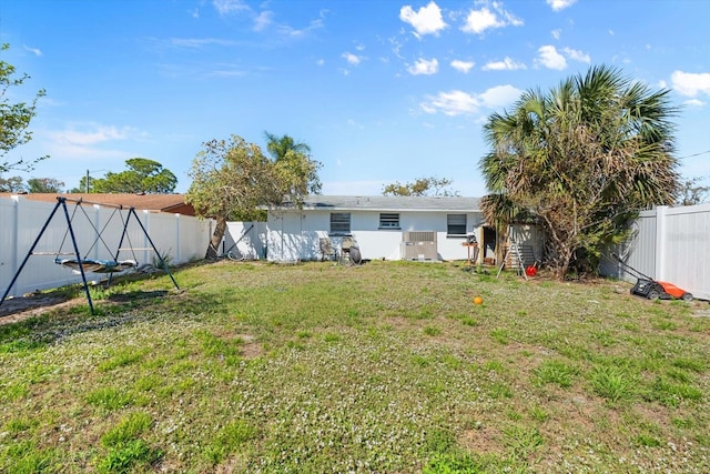 view of yard with a fenced backyard