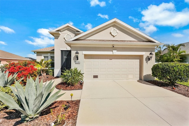 ranch-style house featuring driveway, an attached garage, and stucco siding