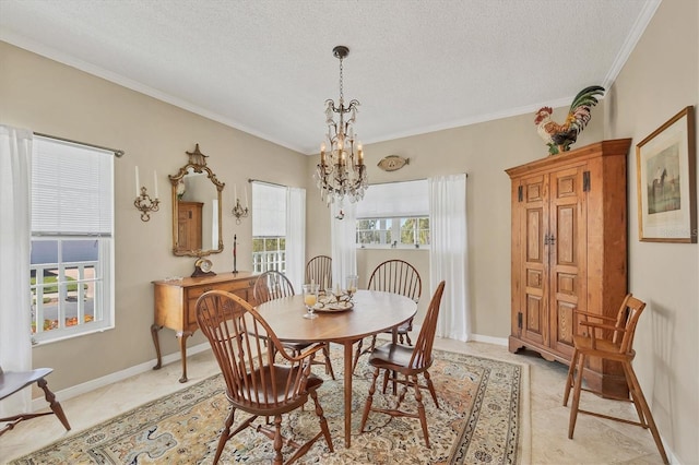 dining space featuring baseboards, a notable chandelier, ornamental molding, and a textured ceiling