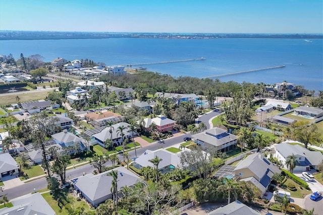 aerial view with a water view and a residential view