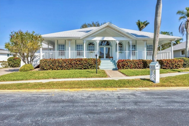 view of front facade with a porch and a front yard