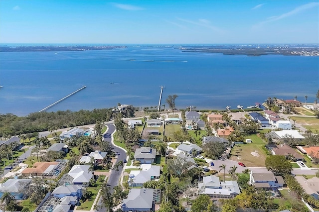 bird's eye view featuring a water view and a residential view