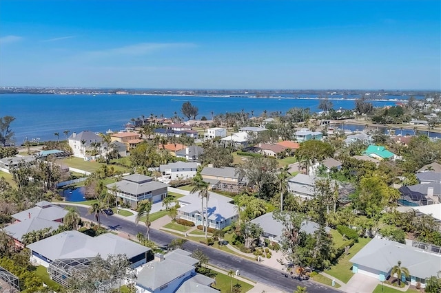 aerial view with a residential view and a water view