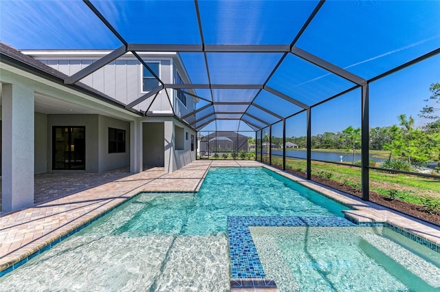 view of swimming pool with a patio, a water view, and a lanai