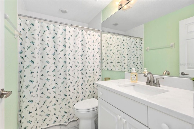 full bathroom with toilet, a shower with curtain, tile patterned flooring, and vanity