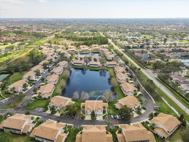 bird's eye view with a water view and a residential view