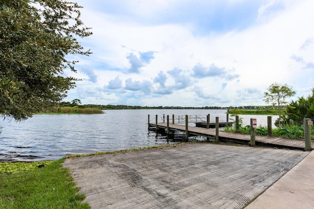 view of dock with a water view