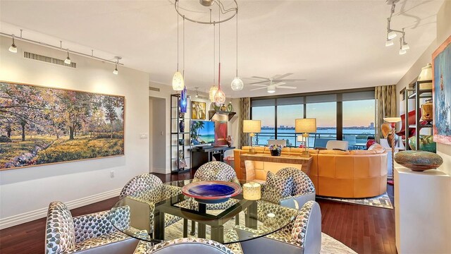 401 S Palm Ave Unit 801, Sarasota, FL 34236 - dining room with track lighting, ceiling fan, wood finished floors, and visible vents