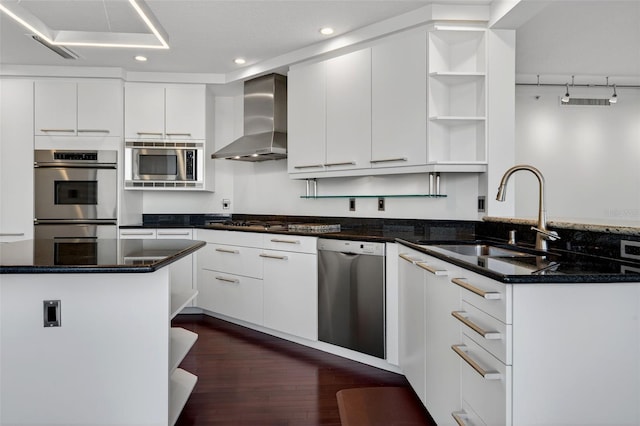 401 S Palm Ave Unit 801, Sarasota, FL 34236 - kitchen with appliances with stainless steel finishes, wall chimney range hood, open shelves, recessed lighting, and white cabinetry