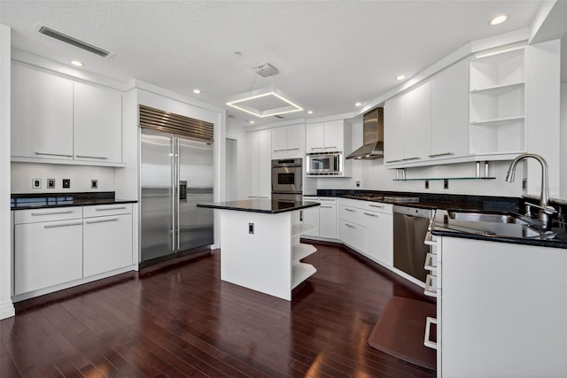 401 S Palm Ave Unit 801, Sarasota, FL 34236 - kitchen with built in appliances, open shelves, wall chimney exhaust hood, dark countertops, and recessed lighting