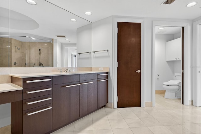 401 S Palm Ave Unit 801, Sarasota, FL 34236 - bathroom with vanity, a stall shower, recessed lighting, and tile patterned floors