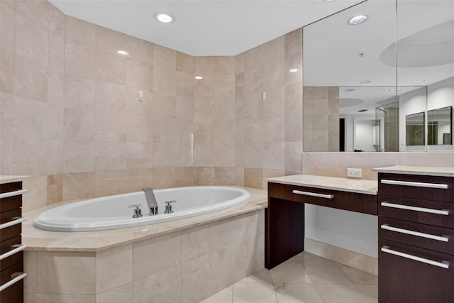 401 S Palm Ave Unit 801, Sarasota, FL 34236 - bathroom with vanity, tile walls, a garden tub, tile patterned flooring, and recessed lighting