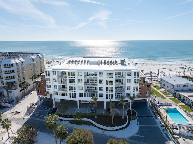 bird's eye view with a water view and a view of the beach