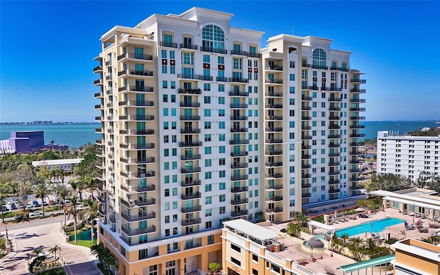 view of building exterior with a water view