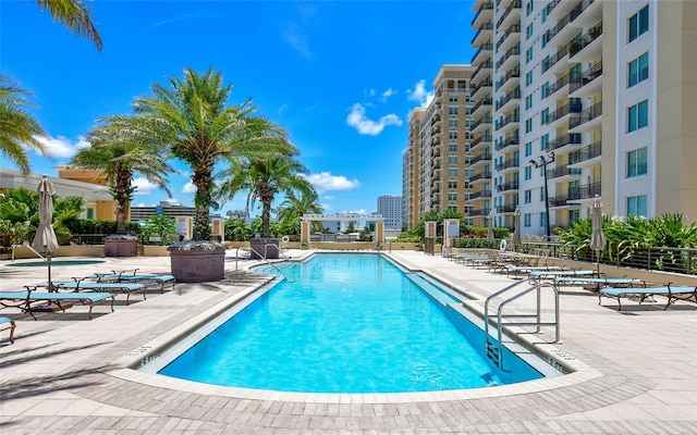 community pool featuring a patio area and a pergola