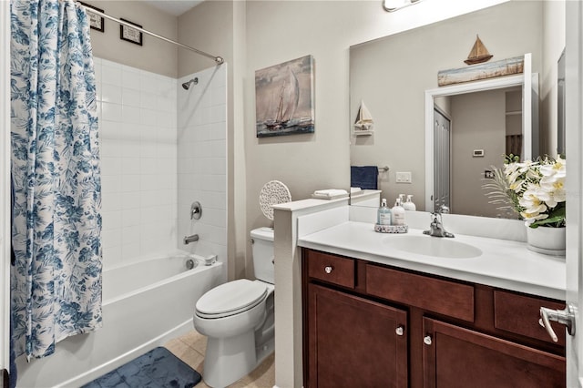 bathroom with toilet, tile patterned floors, shower / bath combo with shower curtain, and vanity