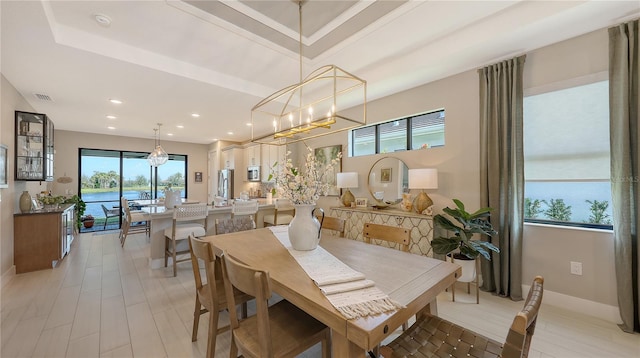 dining room with recessed lighting, visible vents, and baseboards