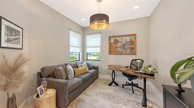 office space with light carpet, baseboards, and recessed lighting