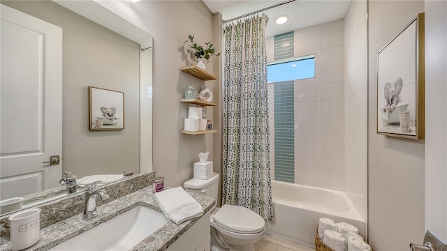 full bath featuring toilet, shower / tub combo, and vanity