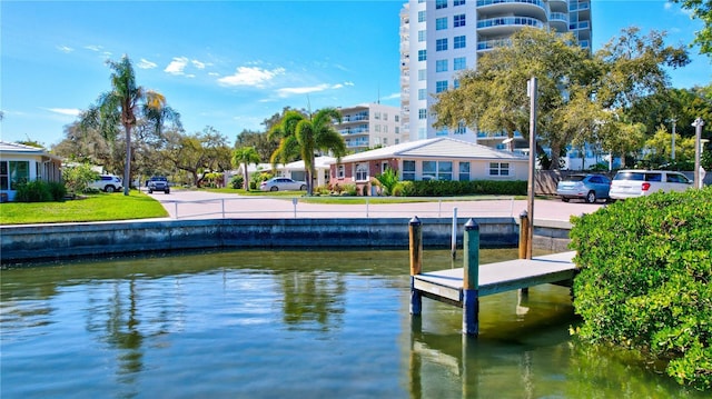 dock area featuring a water view