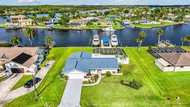 aerial view with a residential view and a water view