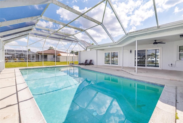 pool featuring ceiling fan, a patio area, and a lanai