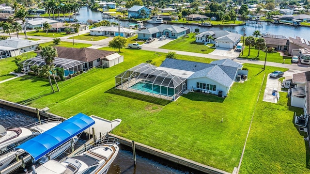 aerial view featuring a residential view and a water view