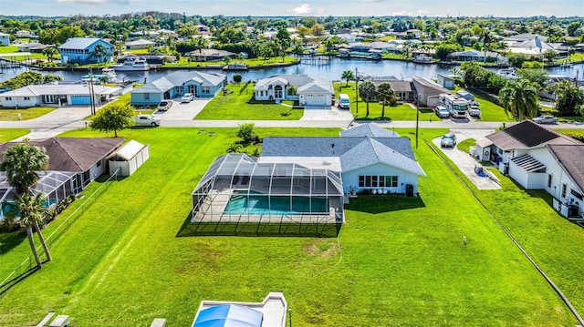 aerial view featuring a water view and a residential view