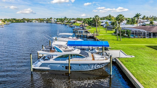 view of dock featuring a yard and a water view