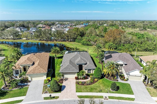 bird's eye view featuring a water view and a residential view