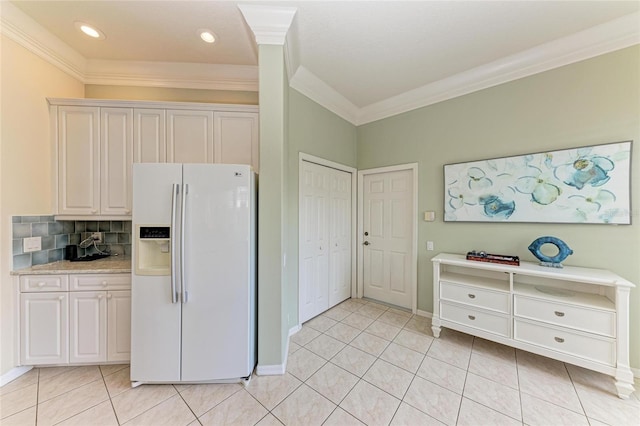 kitchen featuring white refrigerator with ice dispenser, crown molding, light tile patterned floors, light countertops, and decorative backsplash