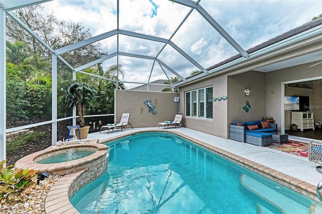 view of swimming pool with a patio area and a pool with connected hot tub